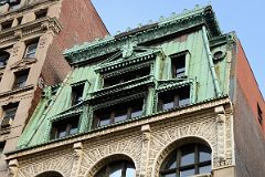 05-2 Detail of Copper Front Mansard Roof And Sixth Story Iron Ornamentation Of New Era Building At 495 Broadway In SoHo New York City.jpg